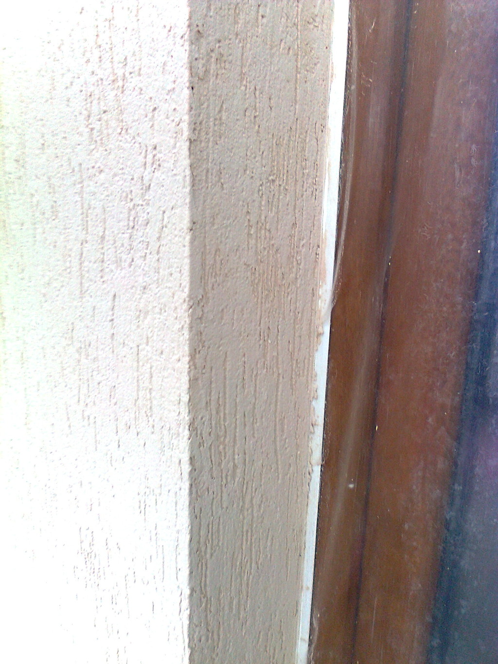Provedení fasádní omítky u ostění oken s APU lištou